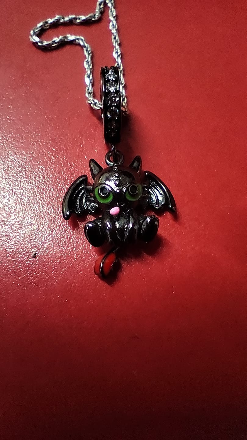 Customer photo review of Charm Chimuelo Negro