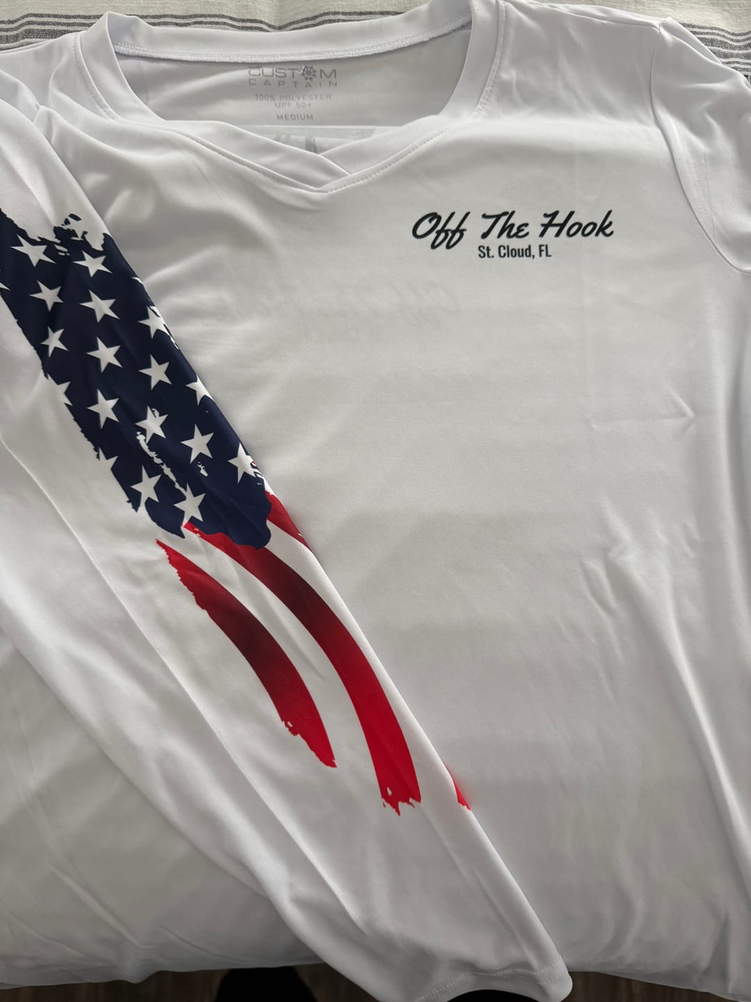 Customer photo review of American Flag Women's Dri-Fit Custom Boat Shirts - Long Sleeve