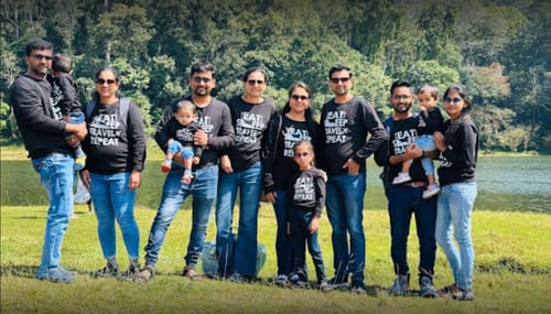 Customer photo review of Eat Sleep Travel Repeat Family Sweatshirts