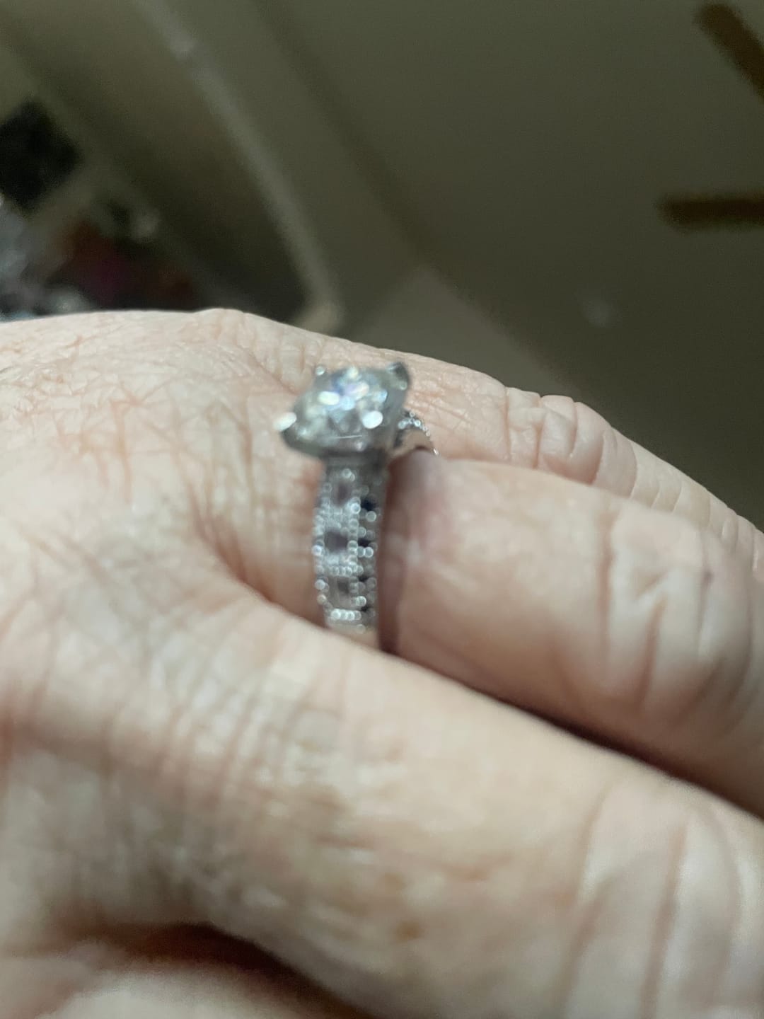 Customer photo review of Hidden Halo Oval Moissanite Three Row Two Tone Engagement Ring