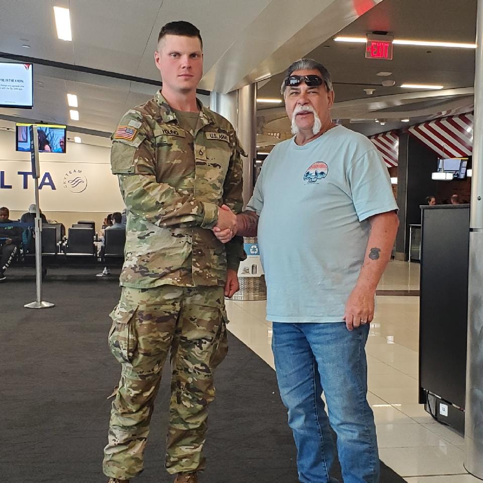 Customer photo review of Honoring All Who Served Thank You Coin