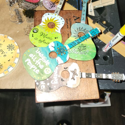 Customer photo review of Unfinished Wood Acoustic Guitar Silhouette - Craft- up to 24" DIY