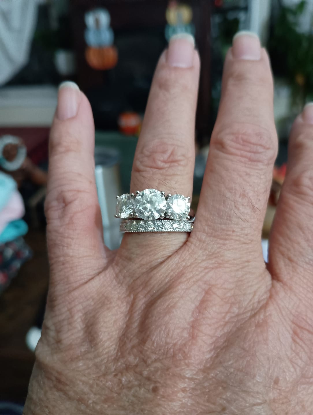 Customer photo review of Classic Three Stone Round Cut Moissanite Engagement Ring