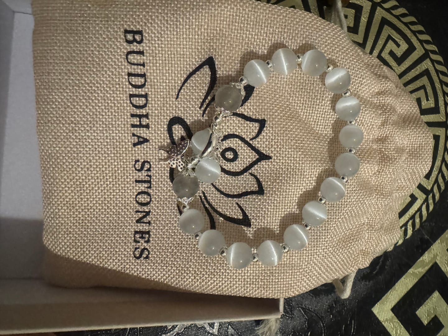 Customer photo review of Buddha Stones Cat's Eye Moonstone Butterfly Star Charm Support Bracelet