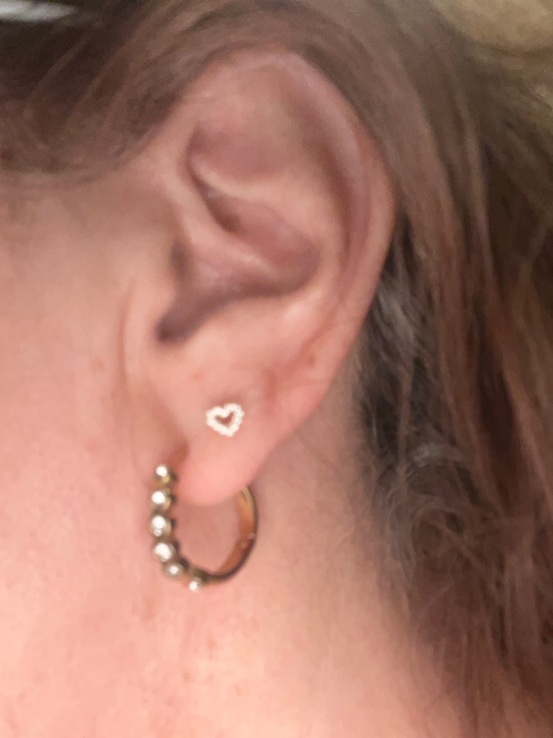 Customer photo review of Heart Piercing | Titan