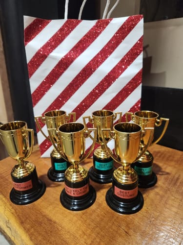 Customer photo review of Office Christmas Sweater Party Murder Mystery Game Kit