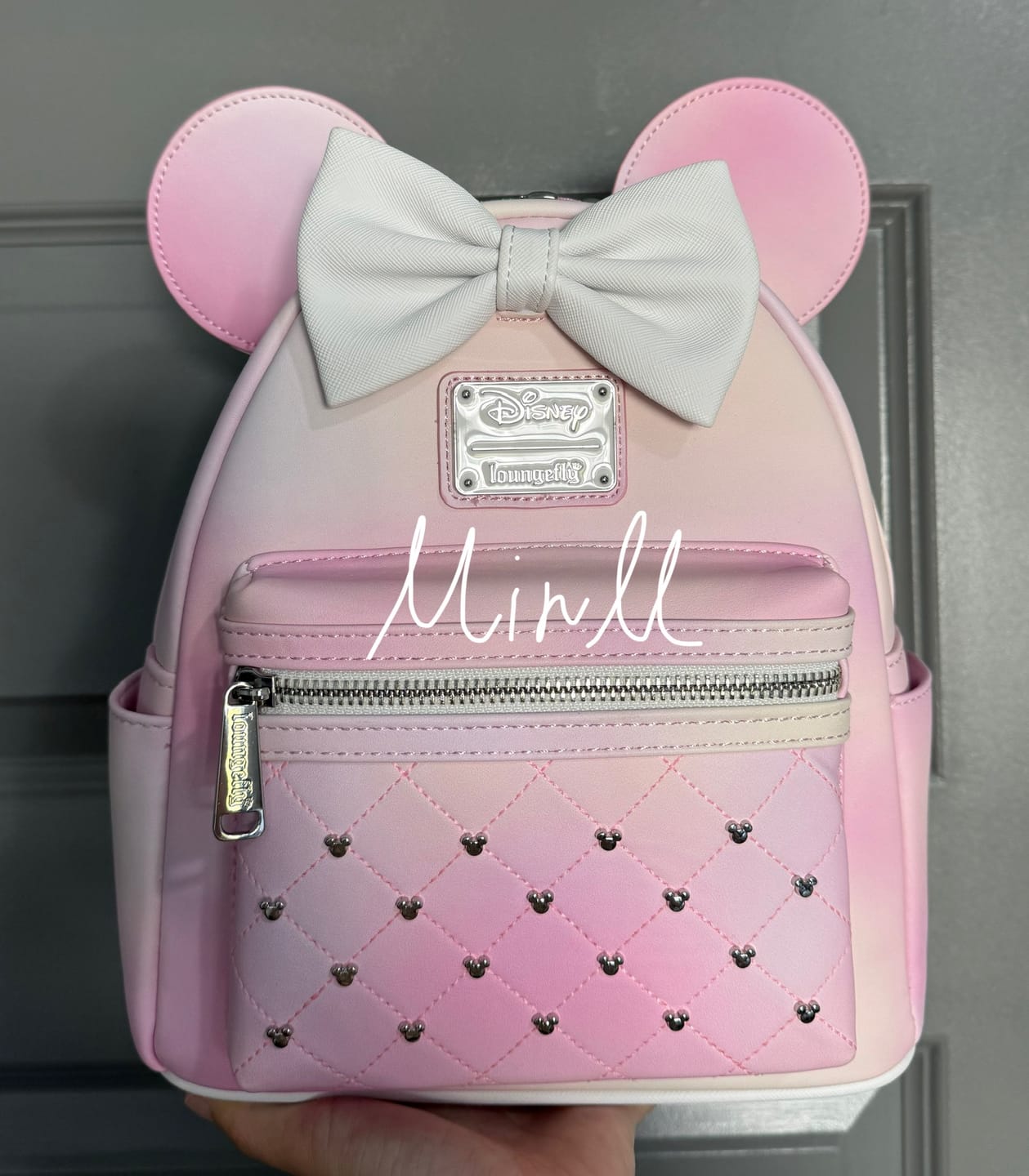Customer photo review of Loungefly Disney The Minnie Mouse Classic Series Mini Backpack: Sakura - 707 Street Exclusive