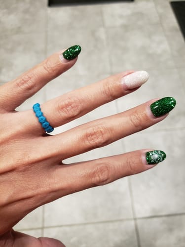 Customer photo review of GIFT RING Women's Stars Silicone Stackable Rings. Soft, Comfortable & Durable Designed Wedding Bands