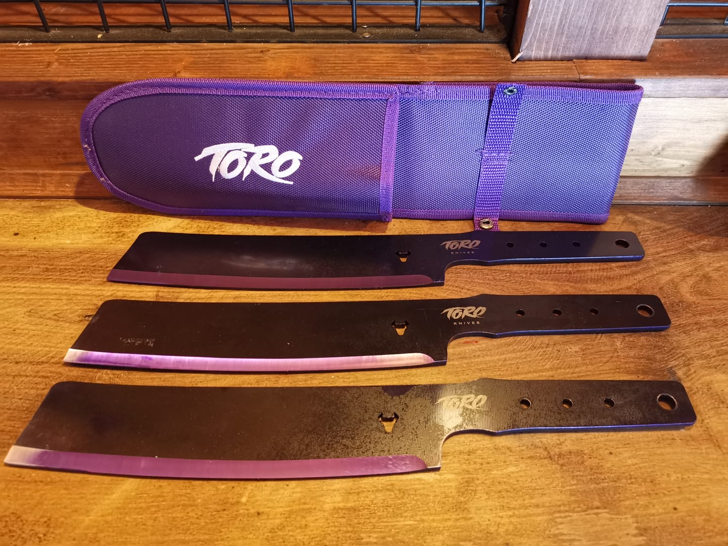 Customer photo review of Besito Slim Throwing Knives: Purple Bevel (Set of 3)