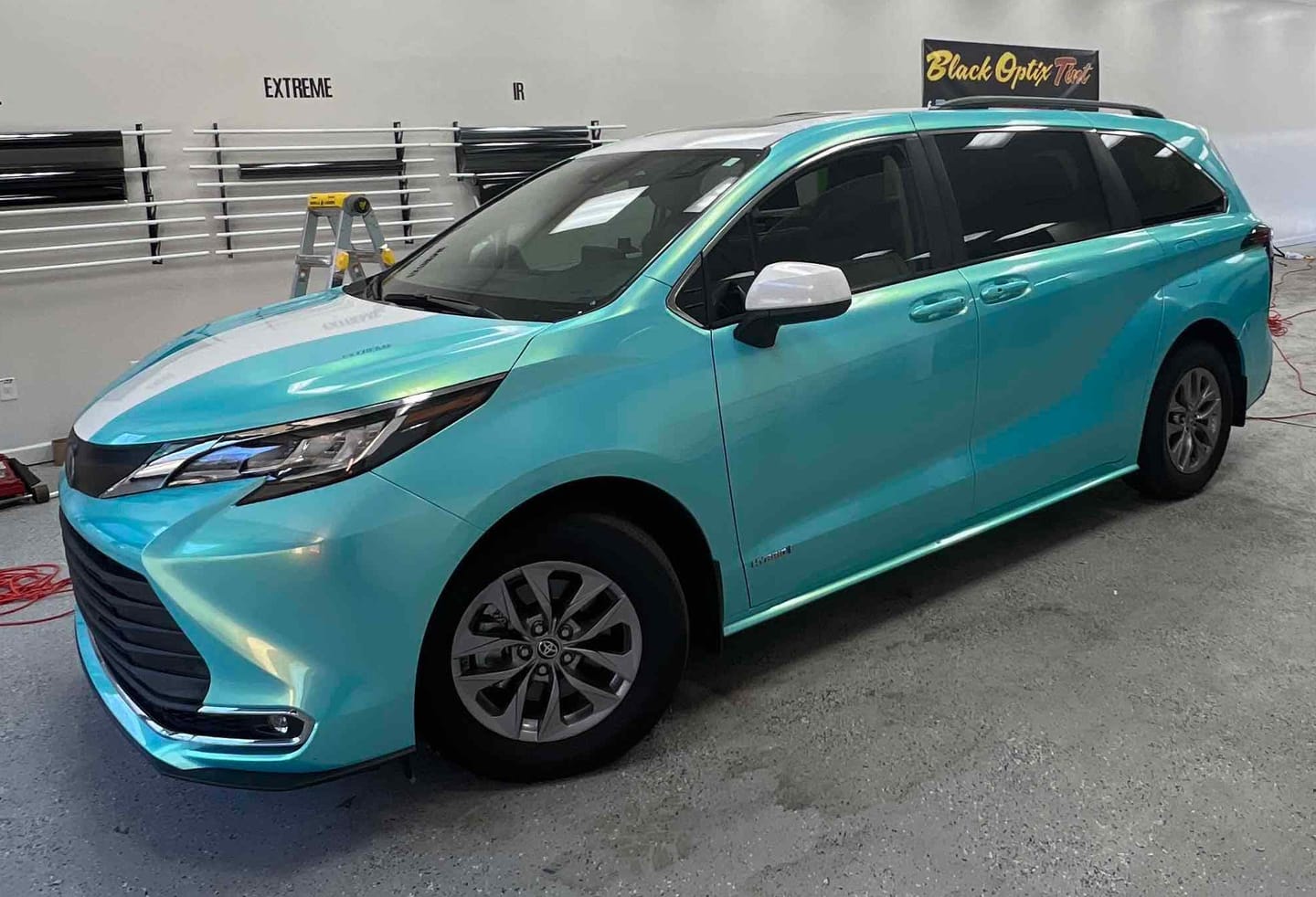 Customer photo review of Candy Metallic Neon Ice Blue Vinyl Wrap