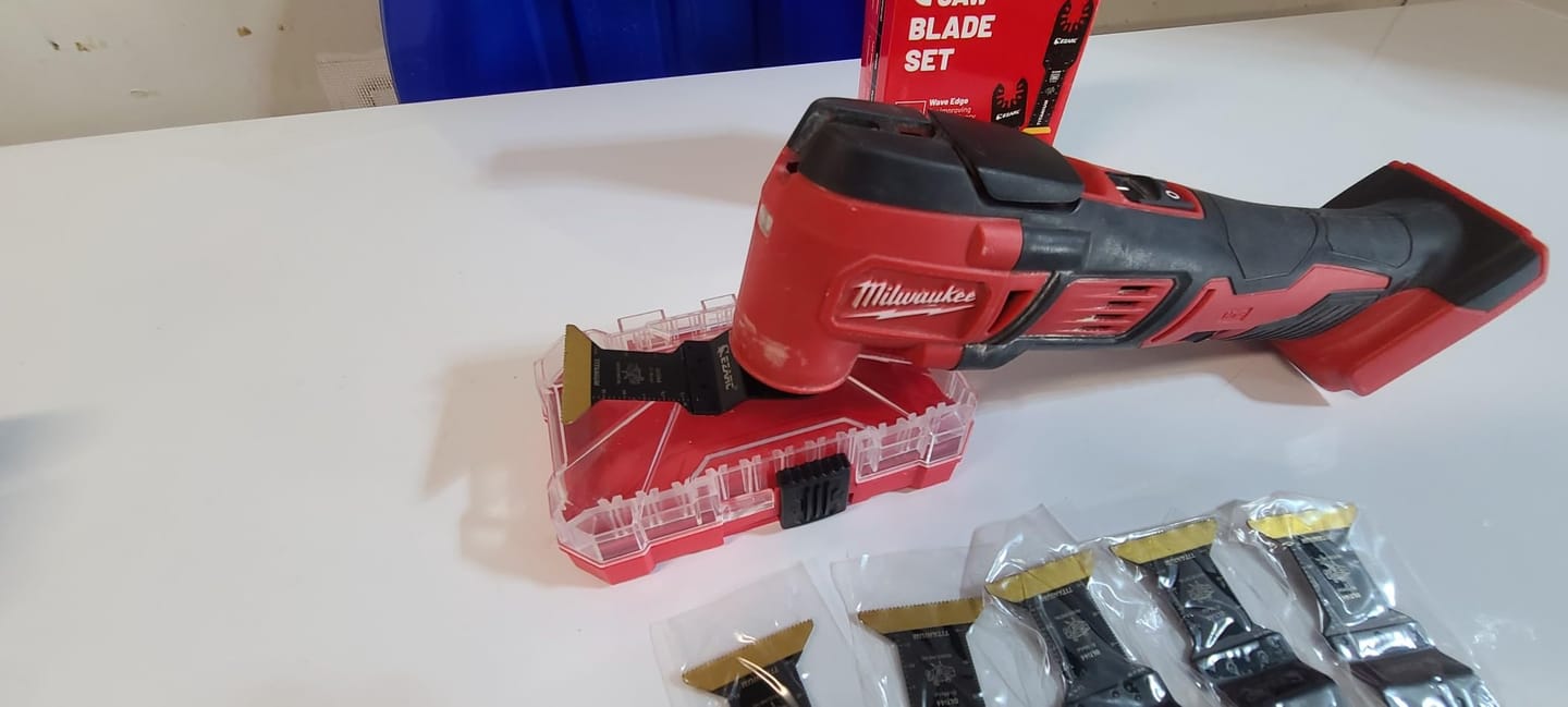 Customer photo review of Standard Length & Extra-Long Oscillating Blades for Metal, Wood Nails, Screws, Plastic