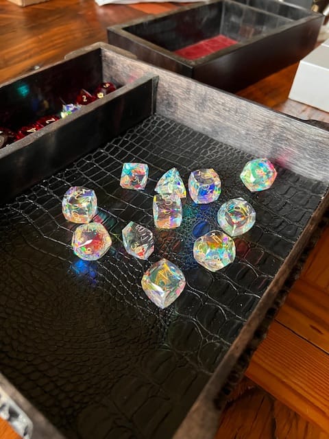 Customer photo review of URWizards D&D Multi-faceted Prism Glass Engraved Dice Set