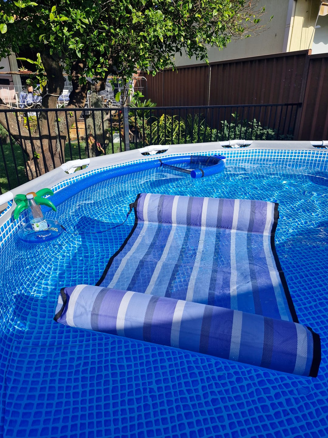 Customer photo review of Water Hammock - with attachable waterproof phone sleeve and inflatable drink holder - GR.