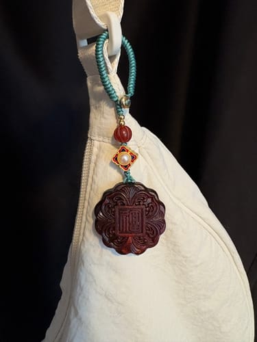 Customer photo review of Yue Bing 月饼 Mooncake Charm Sandalwood Phone & Purse Accessory