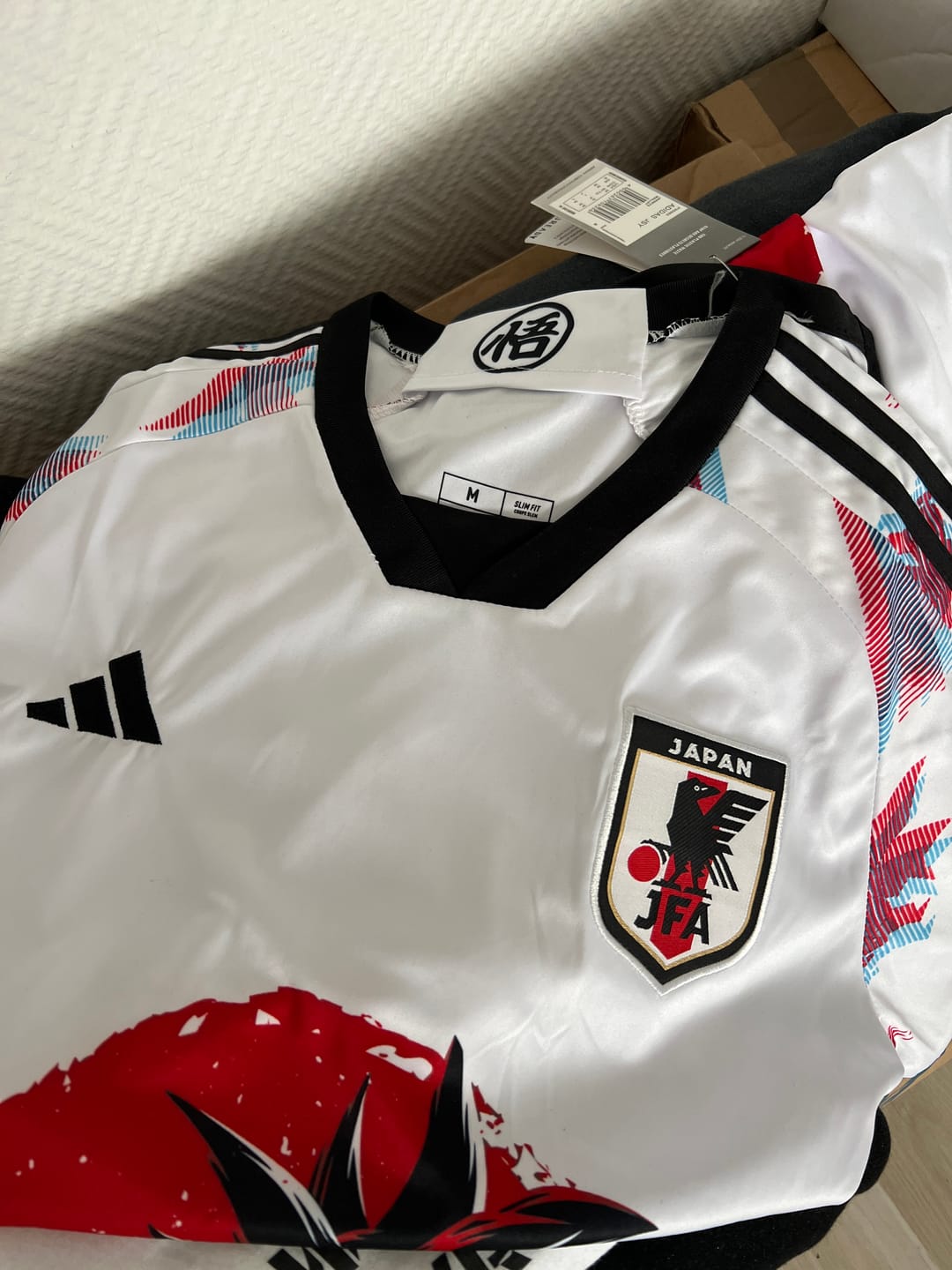 Customer photo review of MAILLOT JAPON 2022/23 - EXTERIEUR RED GOKU