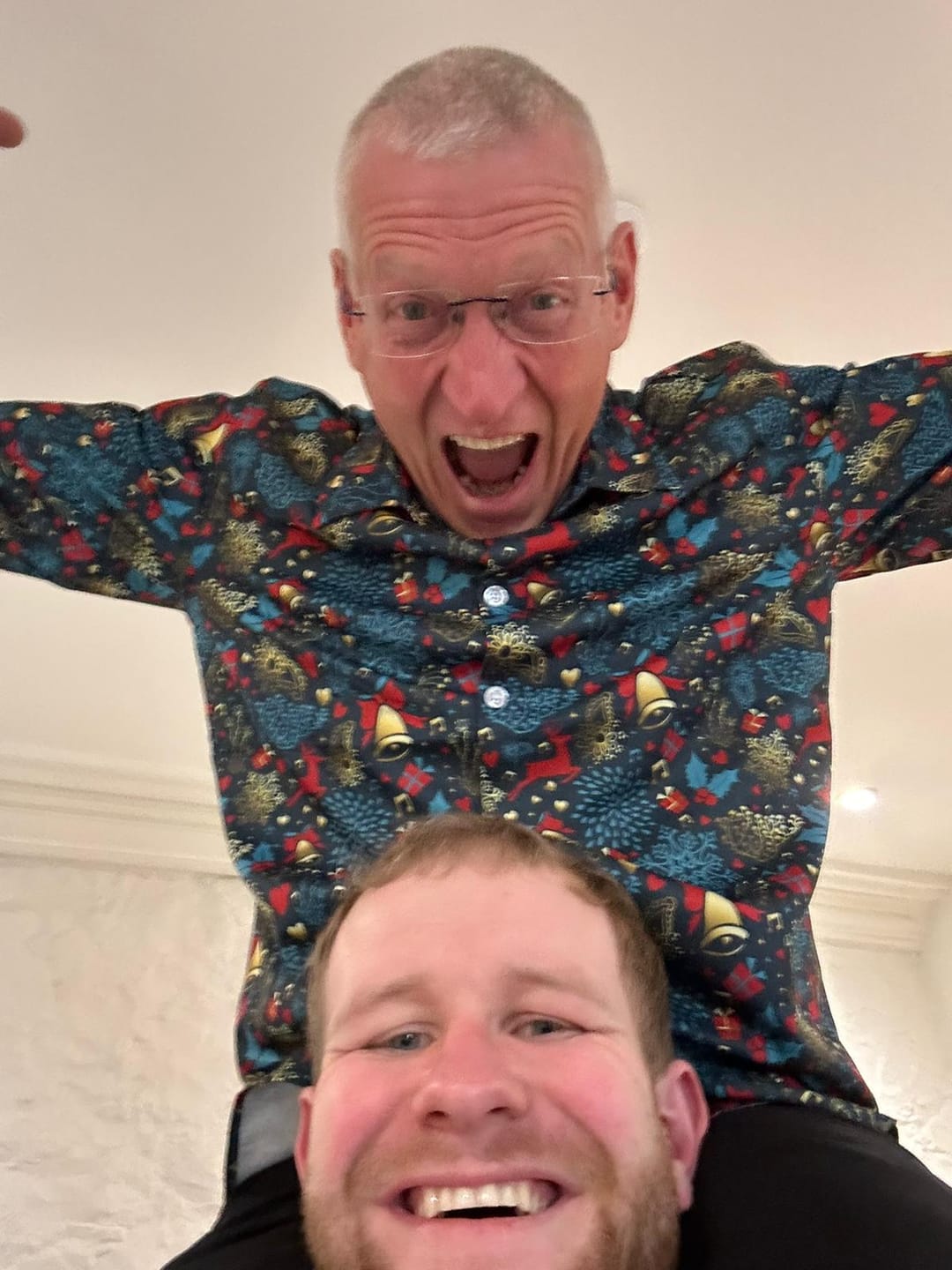 Customer photo review of Men's Christmas Reindeer Funny Xmas Themed Long Sleeve Shirt