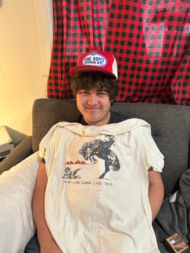 Customer photo review of Ain't Living Long Like This Waylon Jennings Shirt