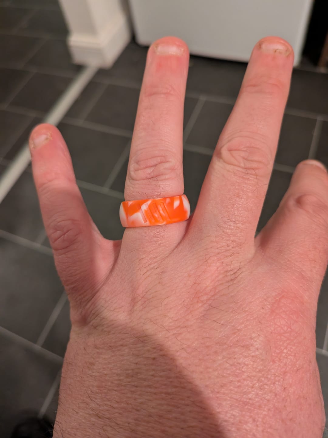Customer photo review of botthms Orange Camo Stripes Silicone Ring