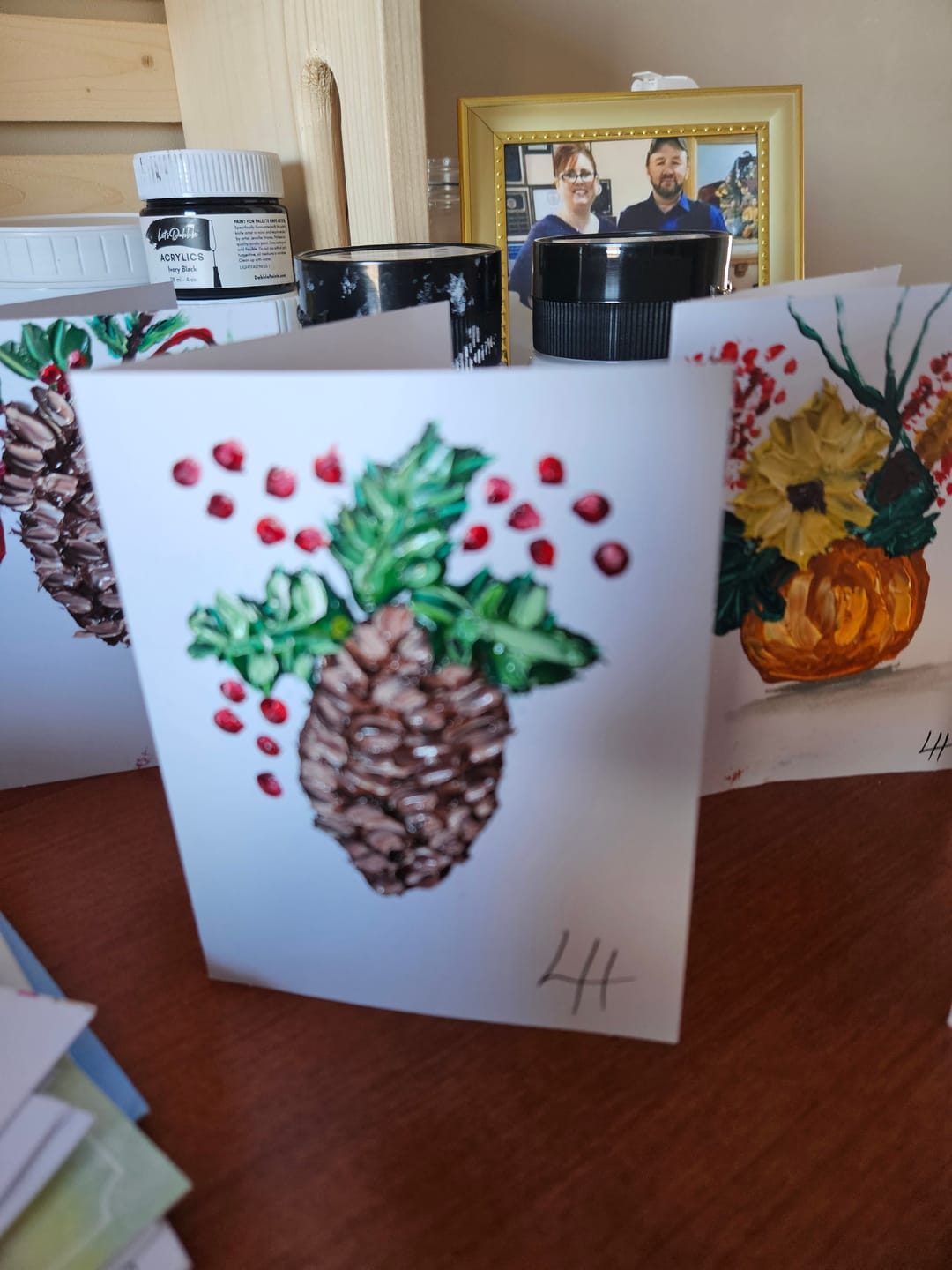 Customer photo review of 20 colors of paint in 16 ounce jars