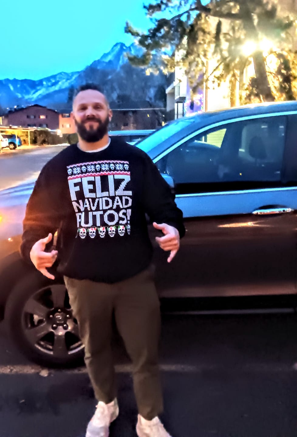 Customer photo review of Feliz Navidad Putos OG Navidad Sweatshirt