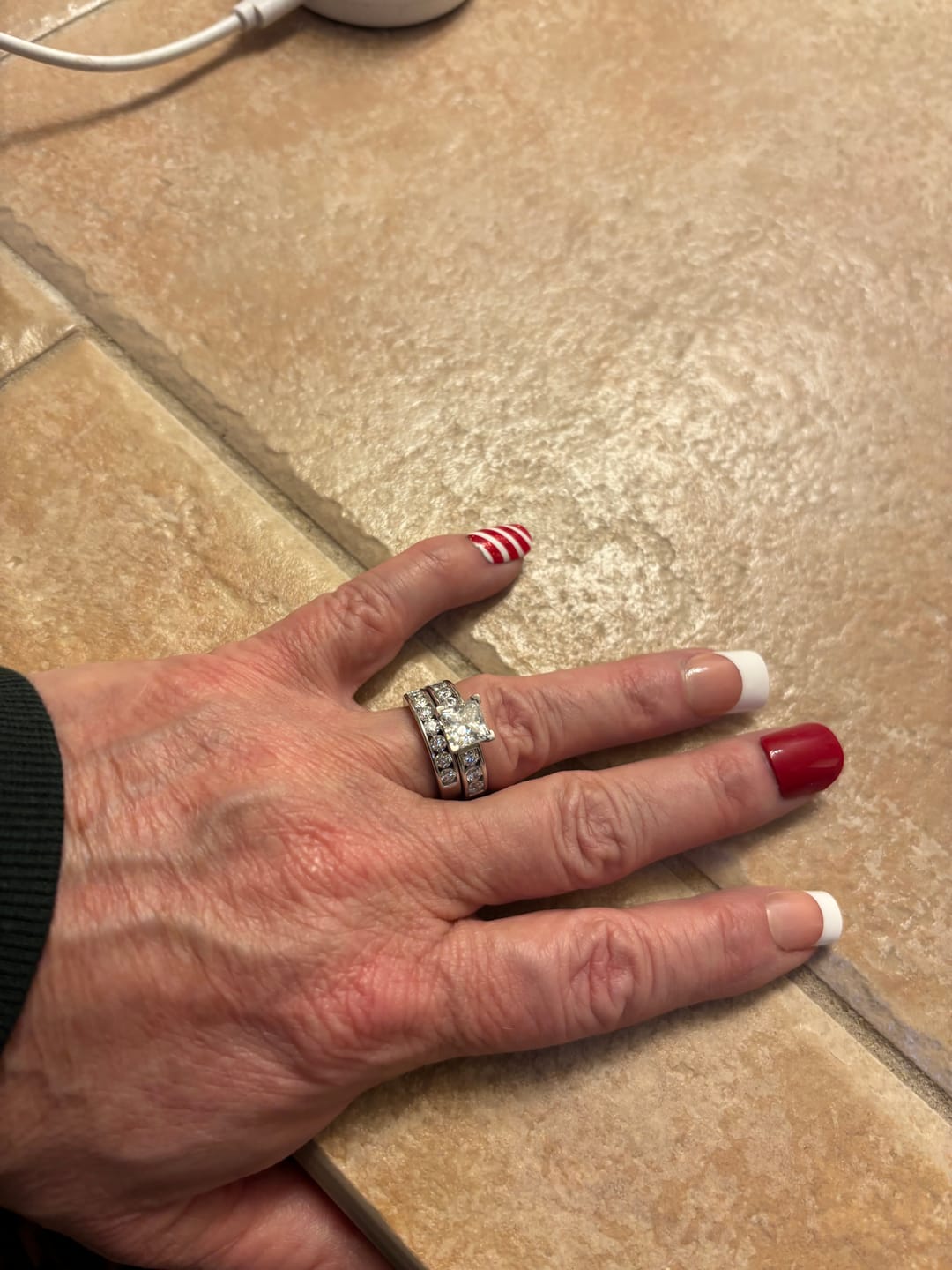 Customer photo review of Princess Cut Moissanite With Round Channel Set Engagement Ring