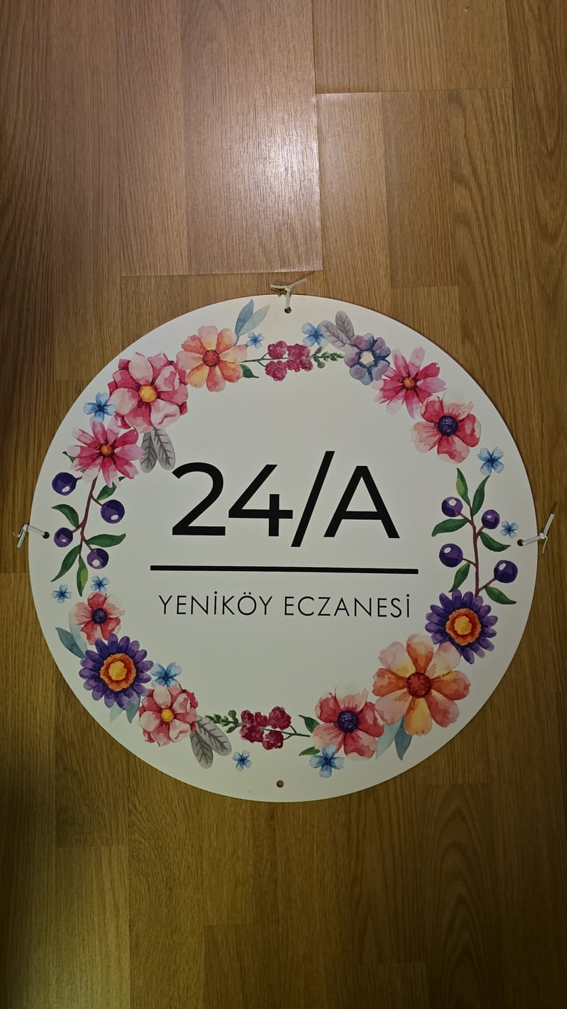Customer photo review of Renkli Çiçek Motifli Yuvarlak Kapı Numarası ve Aile İsmi Tabelası