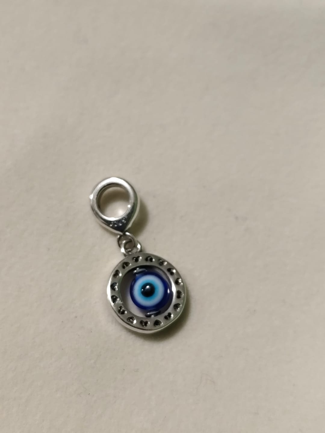 Customer photo review of Charm Ojo Turco Giratorio