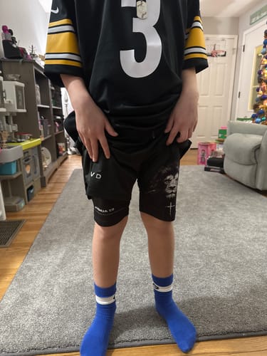 Customer photo review of Psalm 28:7 'Shield of Strength' Youth Performance Shorts