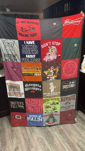T-shirt quilt with pulling, drinking themes by Megan from IA