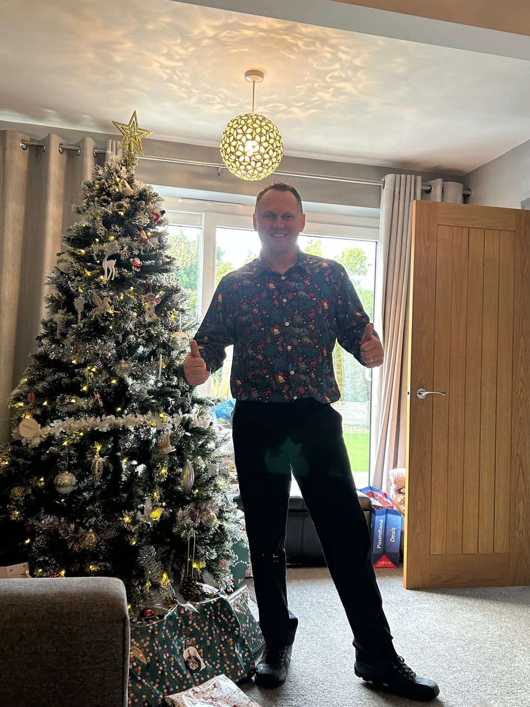 Customer photo review of Men's Christmas Reindeer Funny Xmas Themed Long Sleeve Shirt