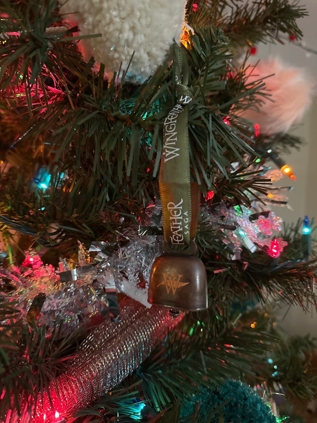 Customer photo review of Toothy Cow Bell Christmas Ornament