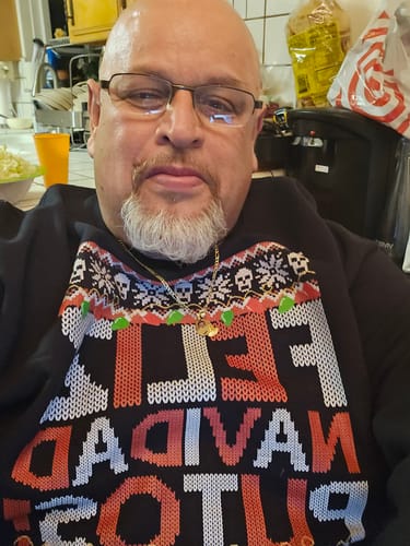 Customer photo review of 2022 Feliz Navidad Putos OG Navidad Sweatshirt