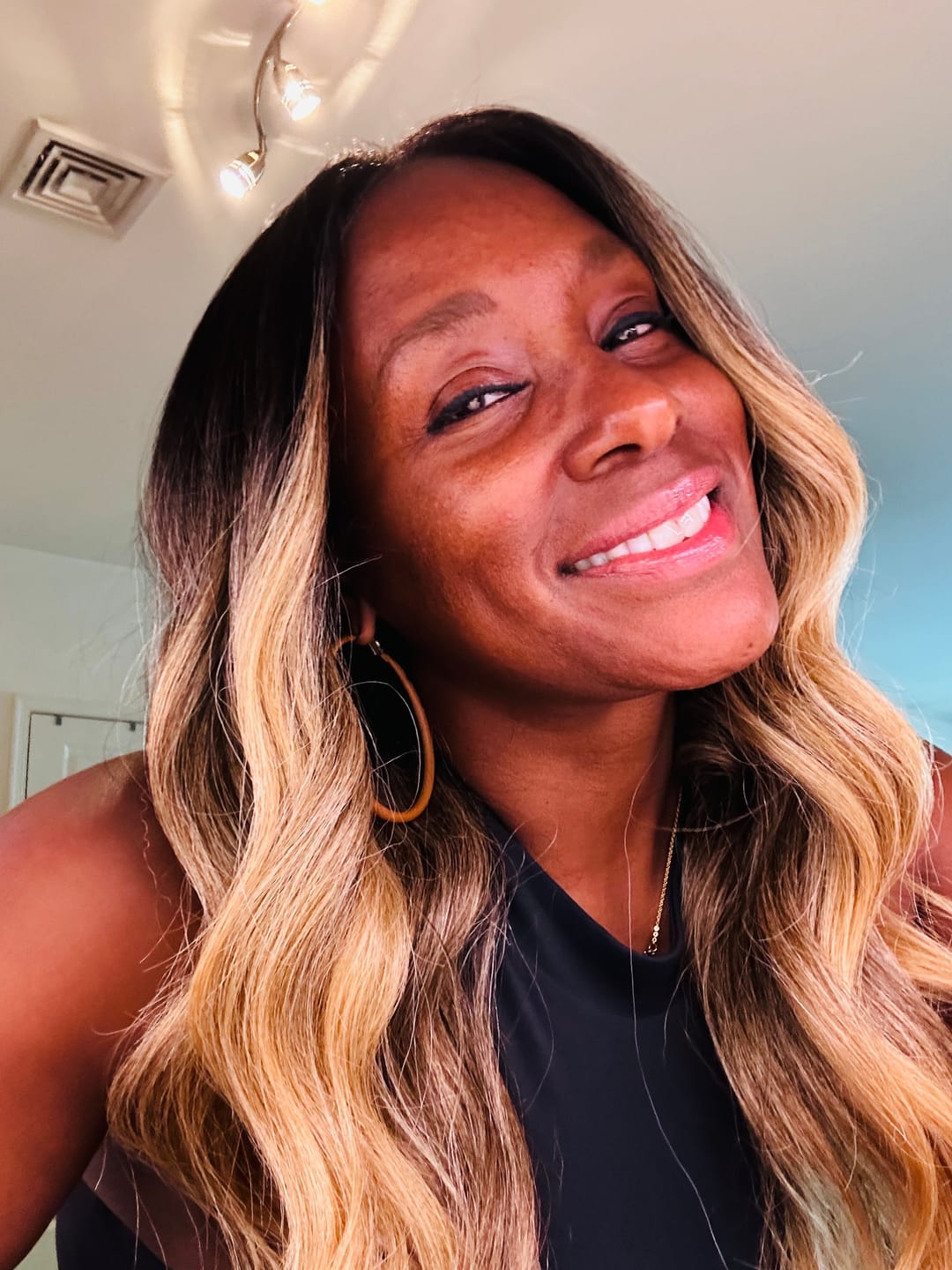 Customer photo review of Outre Perfect Hairline Glueless Synthetic Hair 13X6 HD Lace Front Wig - MONIECE
