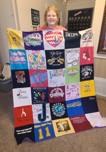 T-shirt quilt featuring haslett high school cheer team by Sabrena from TX