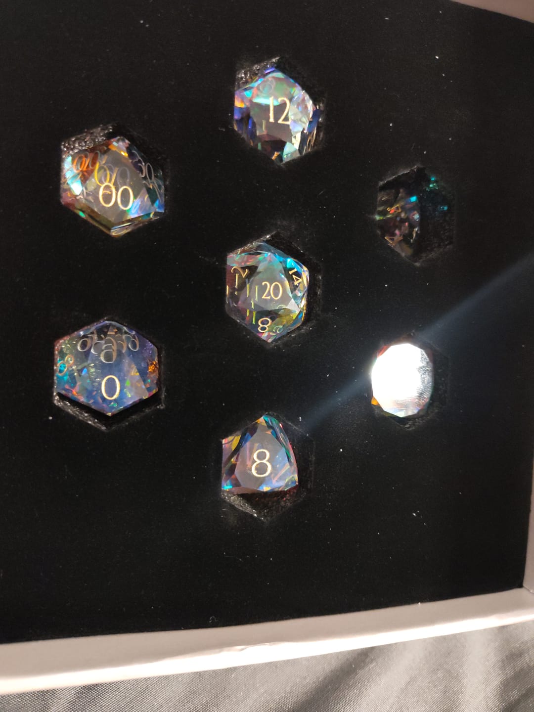 Customer photo review of URWizards D&D Multi-faceted Prism Glass Engraved Dice Set