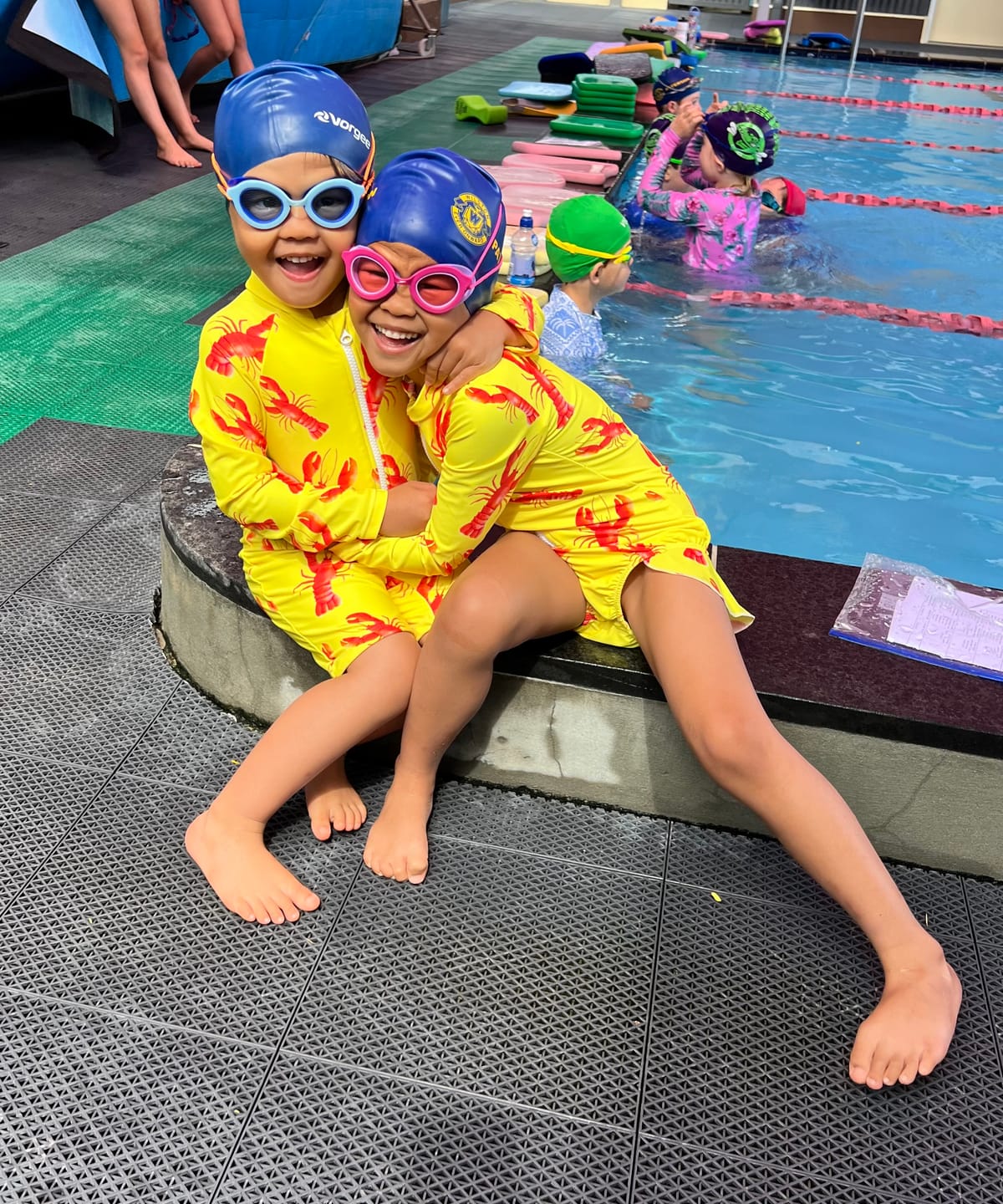 Customer photo review of Bright Lobster Girls Long Sleeve Zip Swimmers