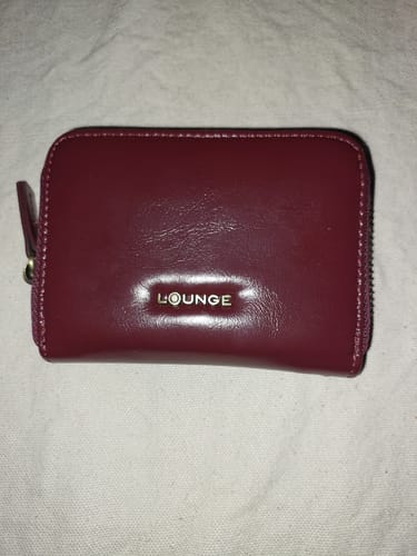 Reseña con foto de un cliente sobre Billetera Con Cierre