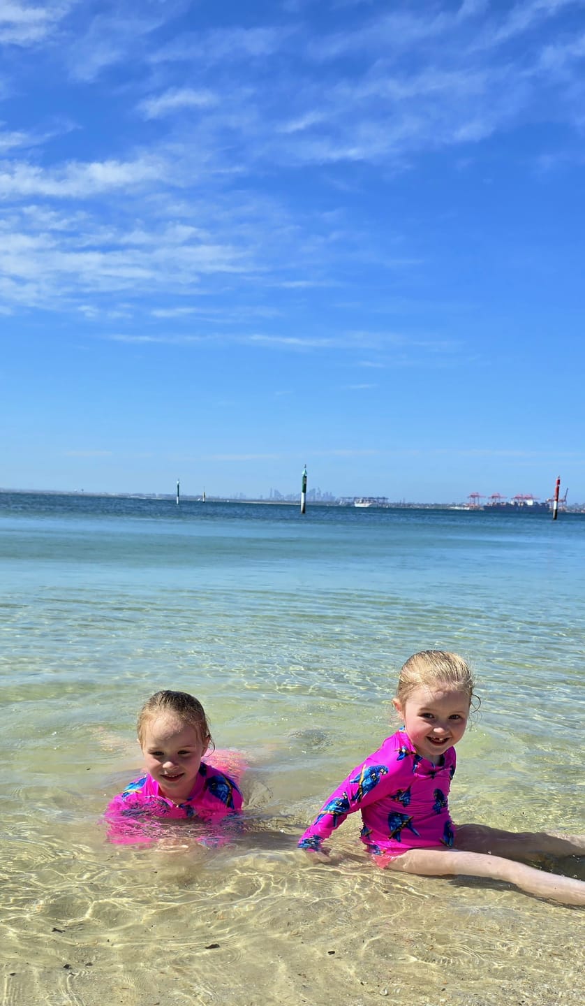 Customer photo review of Fluro Macaw Kids' Rash Top