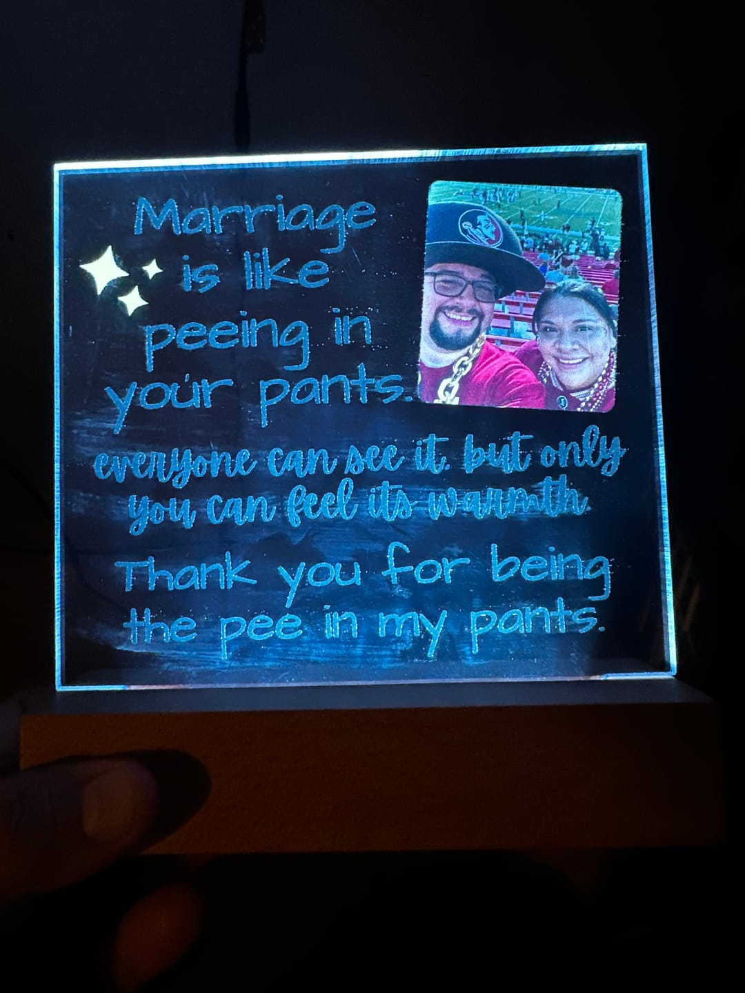 Customer photo review of Marriage Is Like Peeing In Your Pants - Custom Acrylic w/ LED Light Wood Stand - AC36