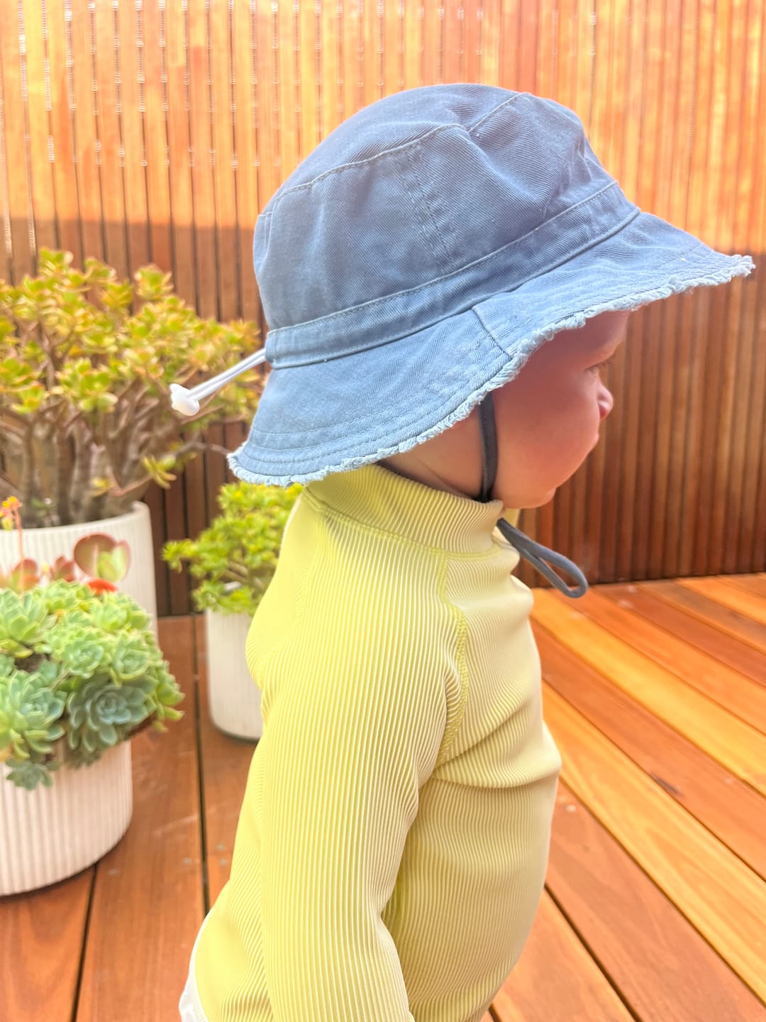 Customer photo review of Mini Stripe Rashie Citrus