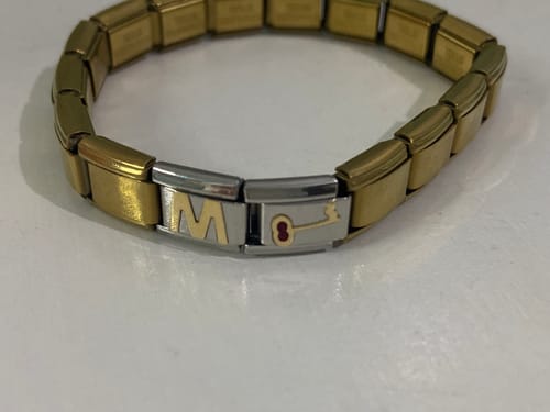 Customer photo review of Charm Llave Dorada