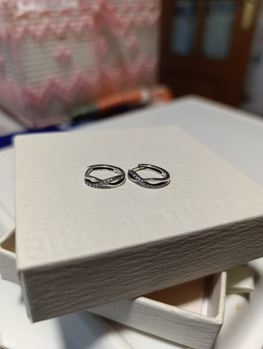Customer photo review of Pendientes Entrelazados