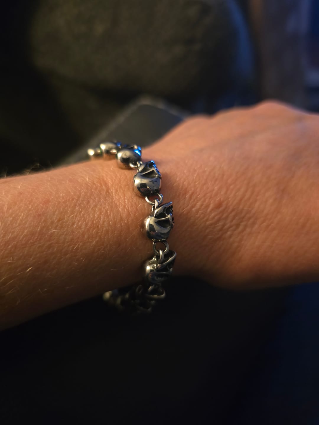 Customer photo review of Skulls Of The Fallen - Stainless Steel Skull Bracelet