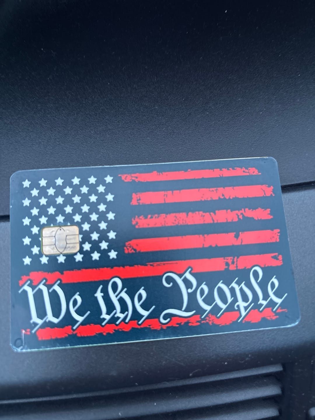 Customer photo review of We The People Flag Credit Card Skin Decal