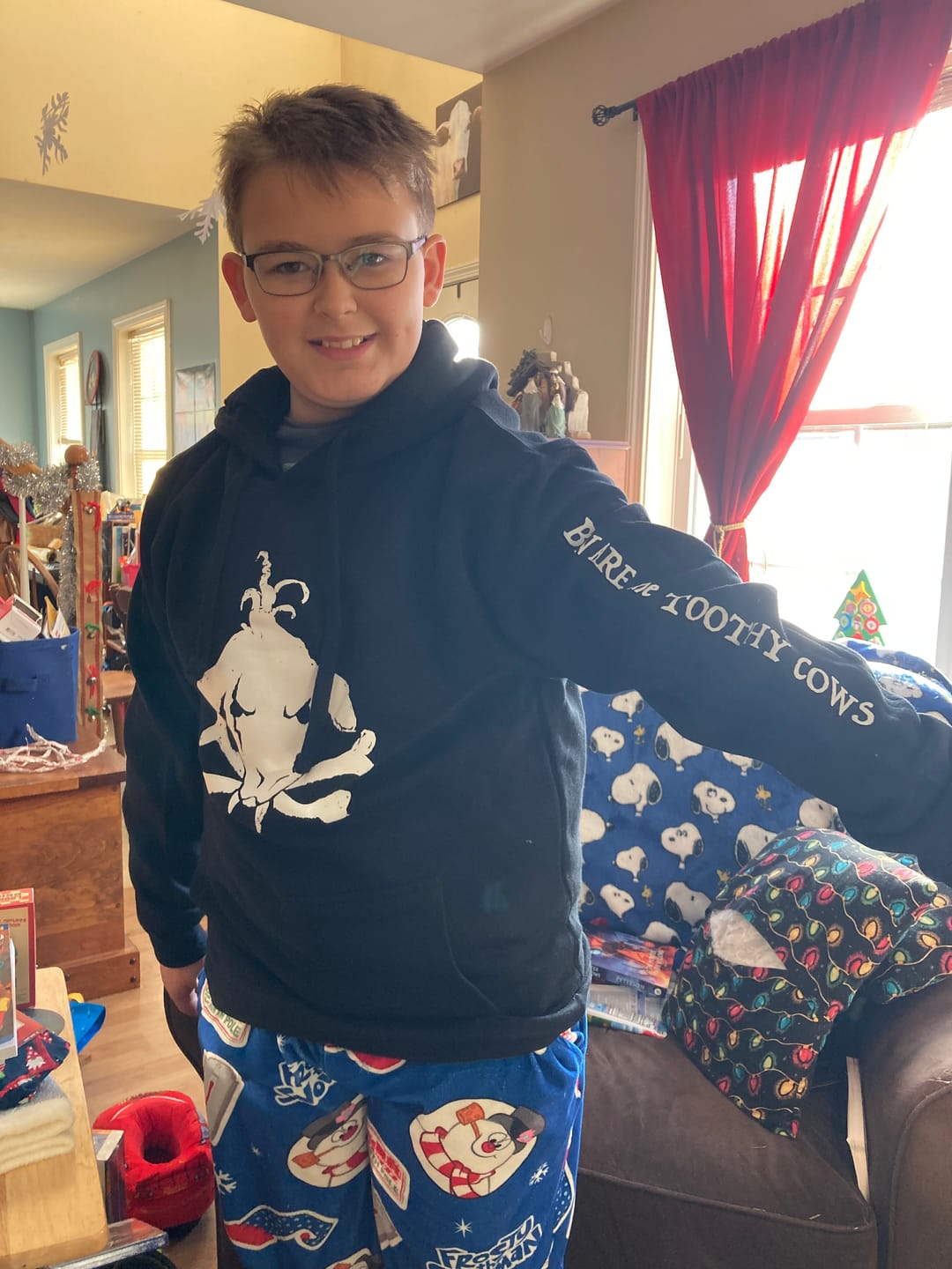 Customer photo review of Toothy Cow Cross Bones Hoodie