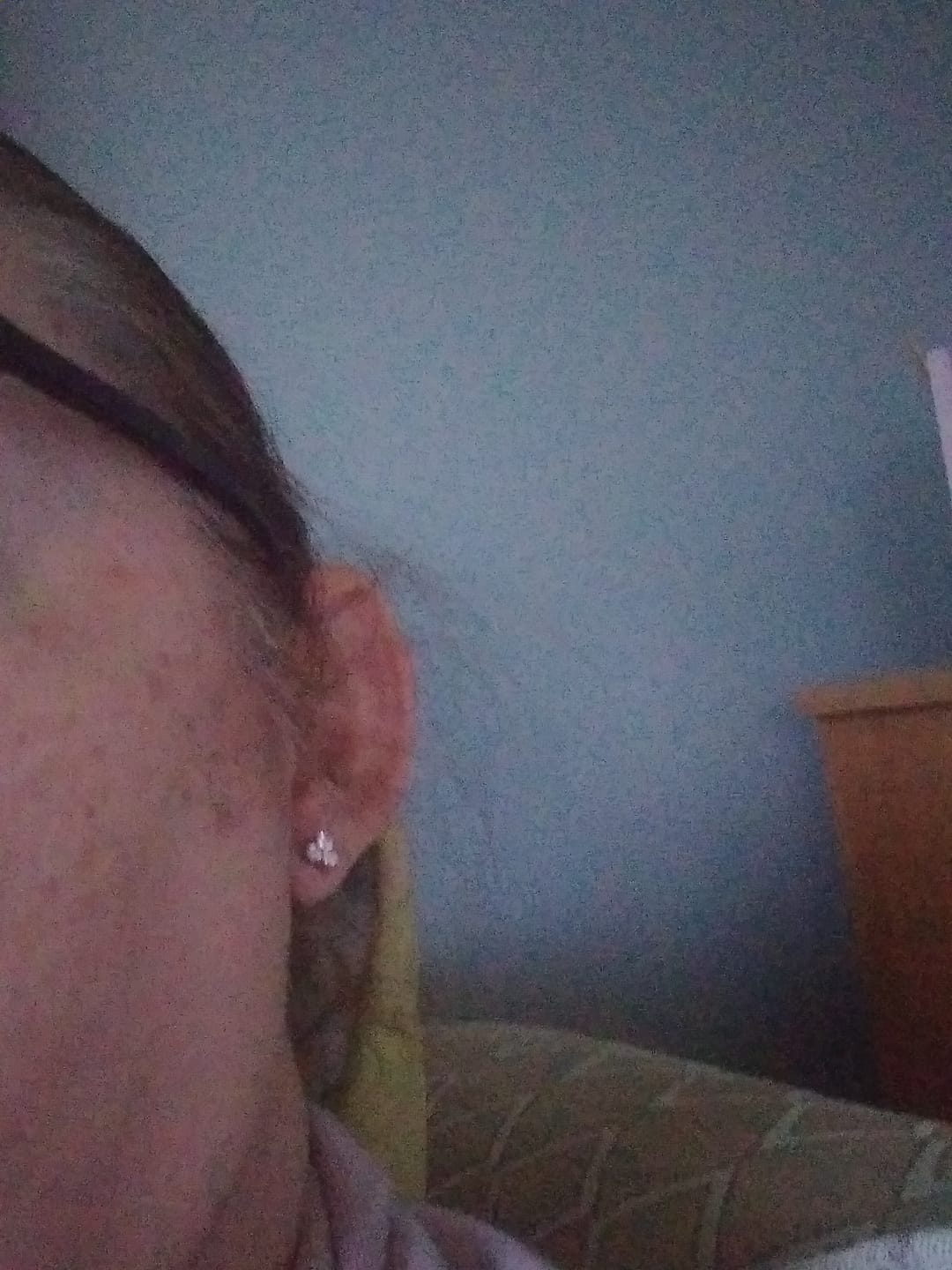 Customer photo review of Trinity Moissanite Sleep Stud Earrings