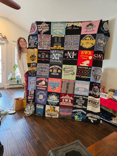 T-shirt quilt featuring wildcat cheerleading by Christopher from NY