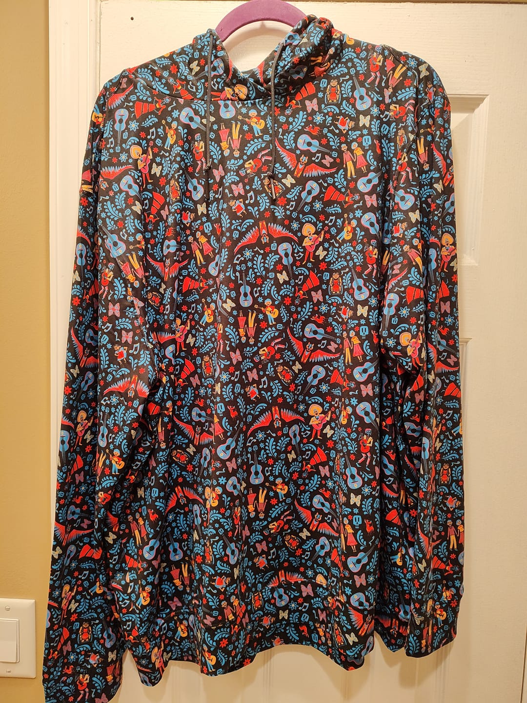 Customer photo review of Disney and Pixar Coco "Music In Me" – Performance Hoodie