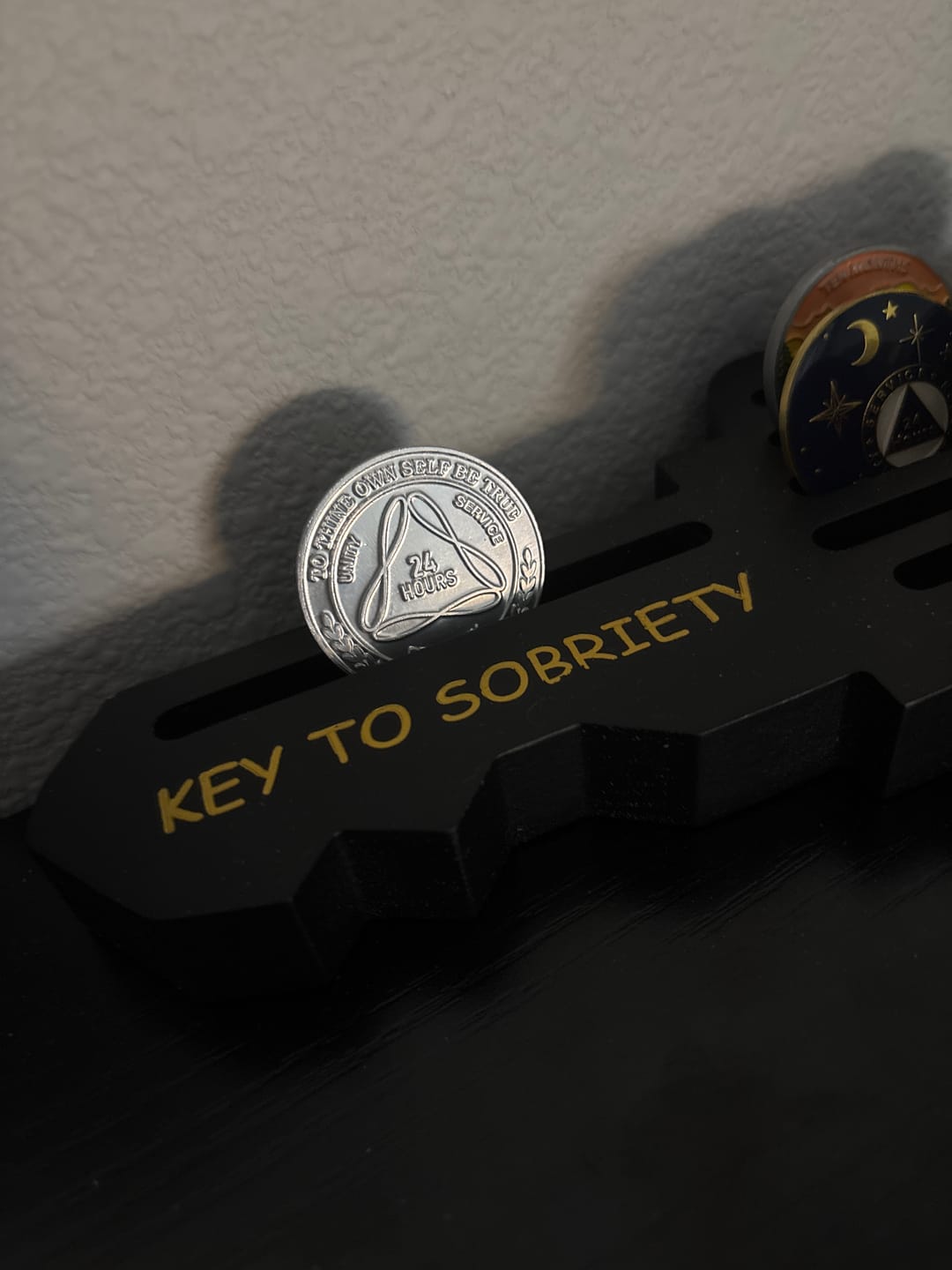 Customer photo review of Sobriety Mint Infinity Aluminum AA Meeting Newcomer Sobriety Chips/Coins/Tokens - 24 Hours - Silver