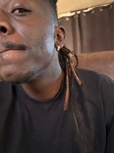 Customer photo review of Moissanite Spiked Huggie Earrings 14k Gold